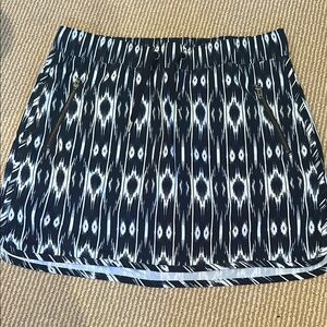 ATHLETA navy and White Mini fitness skirt size medium